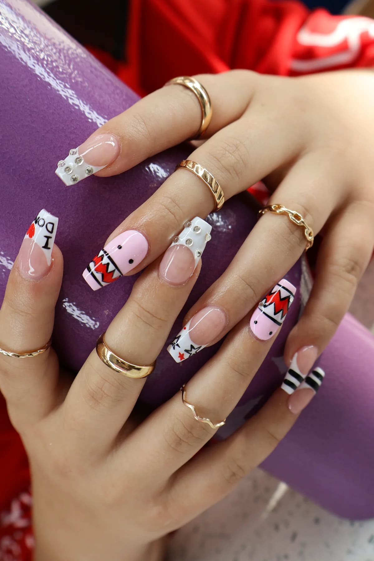 Colorful comic pop-art square nails with playful character details