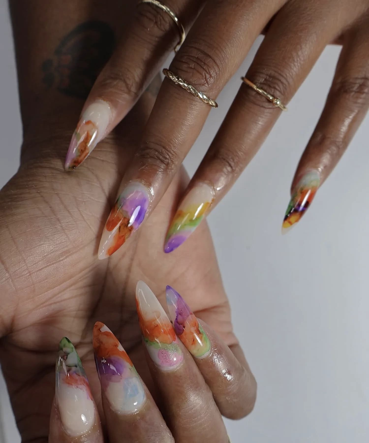 Extra-long stiletto nails with watercolor floral nail art